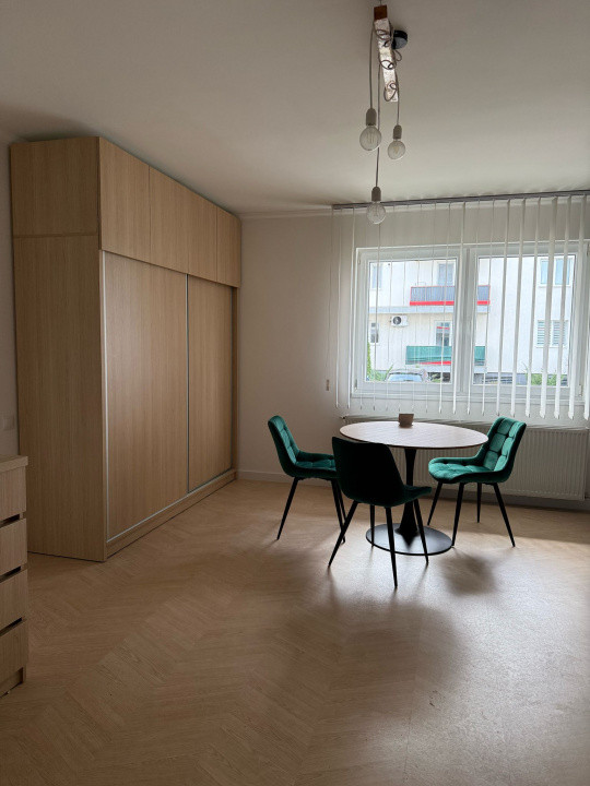 Studio spațios cu nișă de dormit | 45 mp utili | Parter | Mobilat