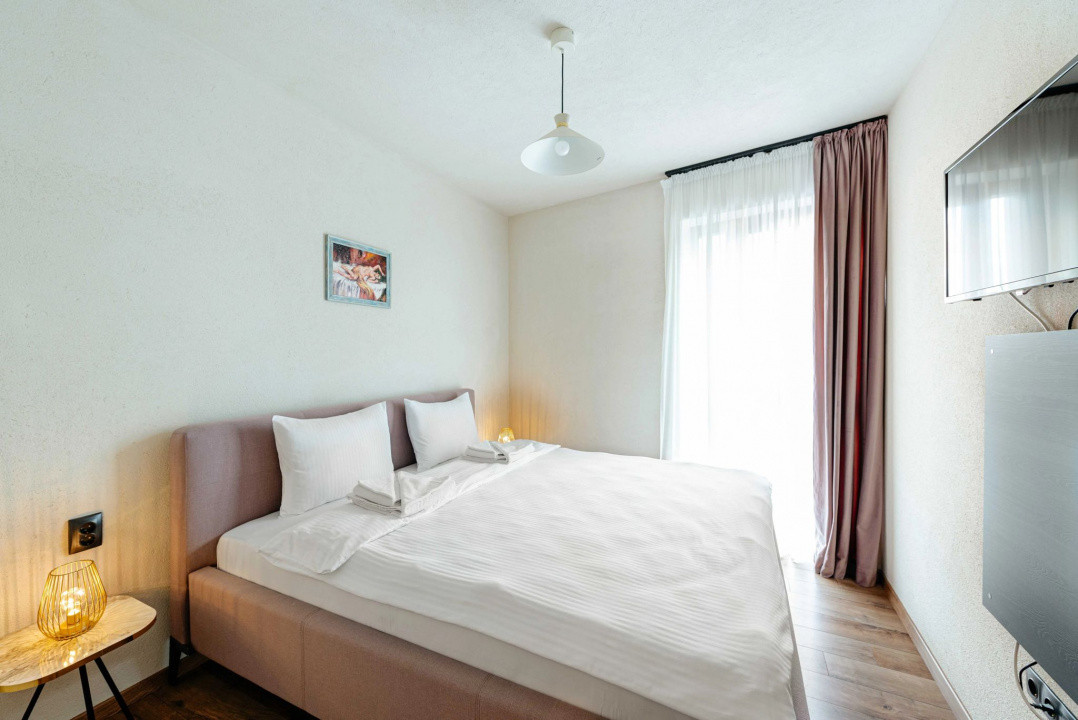 Apartament cu 2 camere în centru, parcare, curățenie săptămânală 