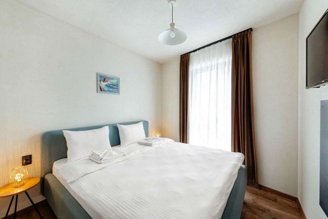 Apartament cu 2 camere în centru, parcare, curățenie săptămânală 