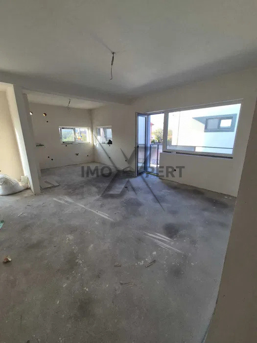 Apartament modern, 100mp, etaj + mansardă, cu grădină și parcare proprie